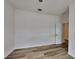 Spacious bedroom with wood-look floors and an adjoining room at 16216 Minorca Dr, Punta Gorda, FL 33955