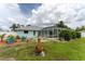 Large backyard with firepit and pool at 7456 Jennifer Dr, Port Charlotte, FL 33981