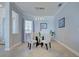 Dining room with tile flooring, a glass table, and modern pendant lighting at 15240 Spanish Point Dr, Port Charlotte, FL 33981