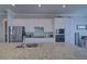 Spacious kitchen featuring stainless steel appliances, granite countertops, and white cabinetry at 15240 Spanish Point Dr, Port Charlotte, FL 33981
