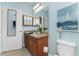 Bathroom featuring a single vanity, granite countertop, and tiled floors at 8883 Tuscany Isles Dr, Punta Gorda, FL 33950