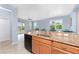 Open kitchen boasting granite countertops and a breakfast bar at 8883 Tuscany Isles Dr, Punta Gorda, FL 33950