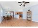 Open concept dining area with hardwood floors and kitchen views at 8883 Tuscany Isles Dr, Punta Gorda, FL 33950