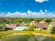 Aerial view of a villa community near a lake at 8883 Tuscany Isles Dr, Punta Gorda, FL 33950