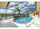 Screened-in pool with view of canal at 2807 Via Paloma Dr, Punta Gorda, FL 33950