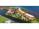 Aerial view of waterfront community, highlighting building location and landscaping at 85 Vivante Blvd # 8524, Punta Gorda, FL 33950