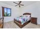 Bright bedroom with floral bedding and wood floors at 85 Vivante Blvd # 8524, Punta Gorda, FL 33950