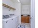 Laundry room with washer, dryer, and cabinets at 85 Vivante Blvd # 8524, Punta Gorda, FL 33950