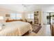 Spacious bedroom with king bed and built-in shelves at 2807 Via Paloma Dr, Punta Gorda, FL 33950