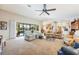 Living area with sliding doors leading to a relaxing poolside patio at 2807 Via Paloma Dr, Punta Gorda, FL 33950