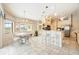 Kitchen with breakfast bar and stainless steel appliances at 2807 Via Paloma Dr, Punta Gorda, FL 33950