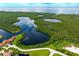 Aerial view showcasing waterfront property and surrounding nature at 2807 Via Paloma Dr, Punta Gorda, FL 33950