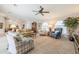 Spacious living room with ample natural light, comfortable seating, and a view of the pool at 2807 Via Paloma Dr, Punta Gorda, FL 33950