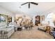Bright and airy living room showcasing an open floor plan and a view into the kitchen at 2807 Via Paloma Dr, Punta Gorda, FL 33950