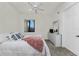 Cozy bedroom with a queen-size bed and built-in dresser at 85 Vivante Blvd # 8524, Punta Gorda, FL 33950
