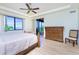 Bedroom with water view, king-size bed, and a dresser at 85 Vivante Blvd # 8524, Punta Gorda, FL 33950