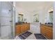 Bathroom with double vanity, soaking tub, and walk-in shower at 85 Vivante Blvd # 8524, Punta Gorda, FL 33950