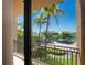 Stunning view of a canal and palm trees from private balcony at 85 Vivante Blvd # 8524, Punta Gorda, FL 33950
