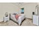 Bedroom with a queen-size bed and a dresser at 85 Vivante Blvd # 8524, Punta Gorda, FL 33950