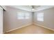Bright bedroom with tile floors and ceiling fan at 8724 Agress Ave, North Port, FL 34287