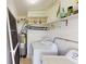 Laundry room with washer, dryer, and shelving at 8724 Agress Ave, North Port, FL 34287