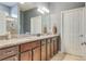 Elegant bathroom with double vanity and granite countertop at 2555 Brassica Dr, North Port, FL 34289