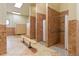 Clean and functional community bathroom with multiple showers at 2555 Brassica Dr, North Port, FL 34289