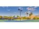 Community tennis courts with a covered seating area at 2555 Brassica Dr, North Port, FL 34289