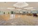 Large ballroom with a dance floor and ample seating at 2555 Brassica Dr, North Port, FL 34289