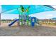 Modern playground with shade structure and slides at 13948 Miranese St, Venice, FL 34293