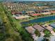 Wide aerial view of community and surrounding area at 13948 Miranese St, Venice, FL 34293