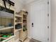Laundry room with shelving and storage at 13948 Miranese St, Venice, FL 34293