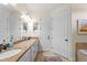 Double vanity bathroom with granite countertop at 13948 Miranese St, Venice, FL 34293