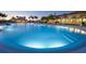 Resort-style pool with a relaxing atmosphere at sunset at 13948 Miranese St, Venice, FL 34293