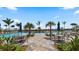 Relaxing resort-style pool with ample lounge chairs and patio tables at 13948 Miranese St, Venice, FL 34293