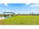 Fenced dog park with shaded seating area at 13948 Miranese St, Venice, FL 34293
