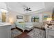 Spacious main bedroom with sitting area and en-suite bath at 13948 Miranese St, Venice, FL 34293