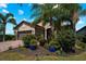 Single-Gathering home with a two-car garage and well-maintained landscaping at 13948 Miranese St, Venice, FL 34293