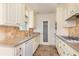Kitchen featuring white cabinetry, granite countertops, and a stainless steel appliance package at 3107 Easy St, Port Charlotte, FL 33952