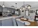 Modern kitchen with gray cabinets and island at 481 Ricold Ter, Port Charlotte, FL 33954