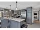 Modern kitchen with gray cabinets and island at 481 Ricold Ter, Port Charlotte, FL 33954