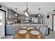 Modern kitchen with gray cabinets and island at 481 Ricold Ter, Port Charlotte, FL 33954