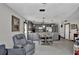 Modern kitchen with gray cabinets and stainless steel appliances at 481 Ricold Ter, Port Charlotte, FL 33954