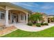 Front entry of the home with a walkway and landscaping at 5480 Sea Edge Dr, Punta Gorda, FL 33950