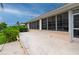 Concrete patio with water views and access to the home at 5480 Sea Edge Dr, Punta Gorda, FL 33950