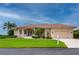 Charming single-story home with a well-maintained lawn at 5480 Sea Edge Dr, Punta Gorda, FL 33950