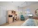 Bedroom with a workspace and relaxing armchair at 5480 Sea Edge Dr, Punta Gorda, FL 33950