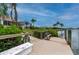 Private dock with a bench, offering a relaxing waterfront view at 5480 Sea Edge Dr, Punta Gorda, FL 33950