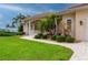 Landscaped walkway leading to the home's entrance at 5480 Sea Edge Dr, Punta Gorda, FL 33950