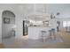 Modern kitchen with stainless steel appliances and breakfast bar at 5480 Sea Edge Dr, Punta Gorda, FL 33950